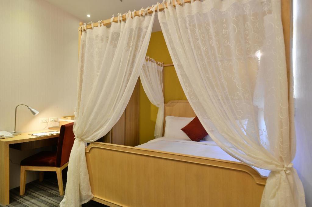 In Young Hotel Каосюн Стая снимка